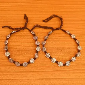 FLOWER PATTERN SILVER LOOKALIKE ADJUSTABLE ANKLETS