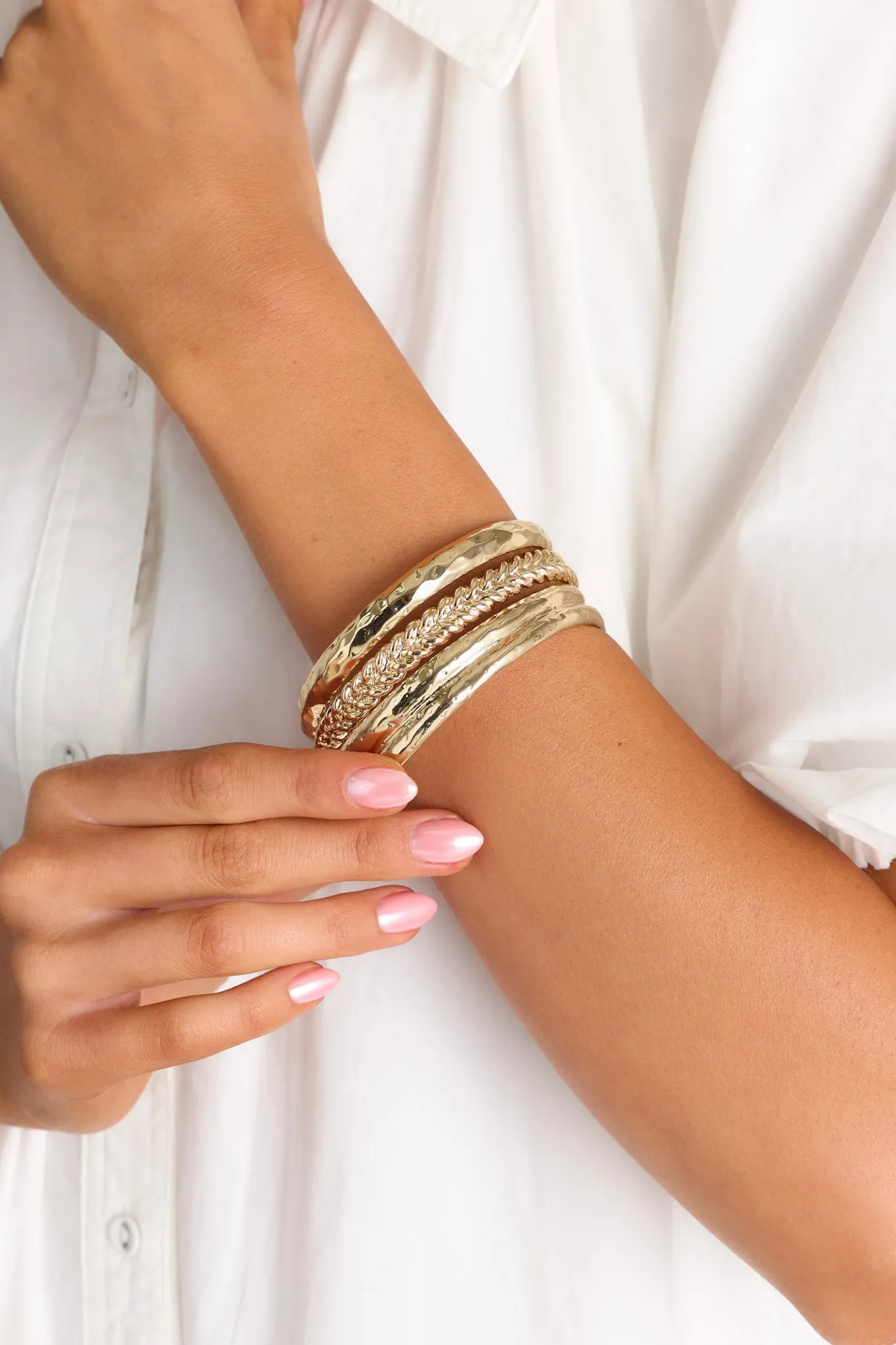 Twisted Elegance Textured Gold Bangle Stack